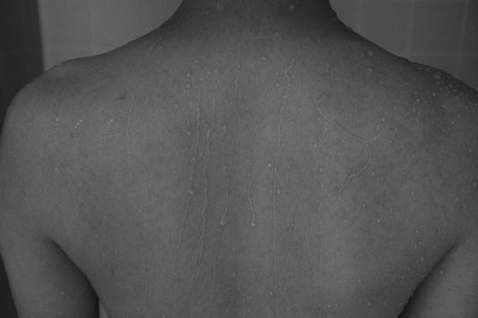 grayscale photography of naked person