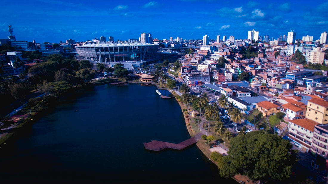 a river running through a city next to tall buildings
