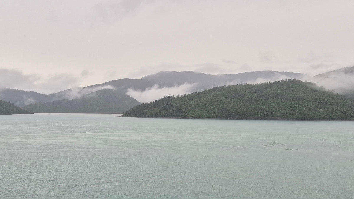 a large body of water surrounded by mountains