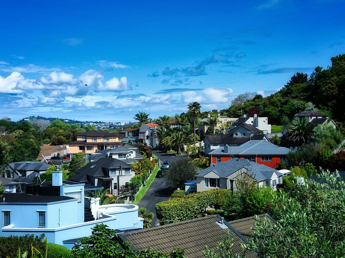 A view of a neighborhood with houses and trees