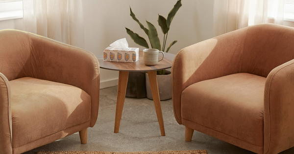 Illustrative photograph of a quiet counselling room with two armchairs