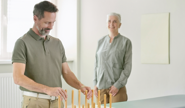 Illustrative photograph of a supervised fine-motor practice activity
