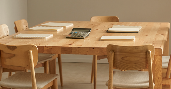 Chairs and notebooks for a group support session