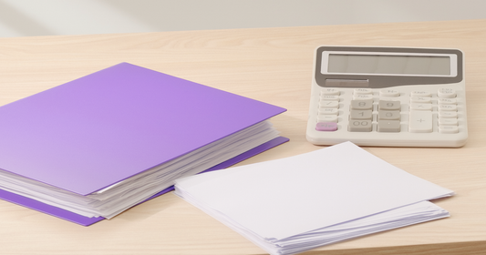Pricing schedule papers and folders on a desk