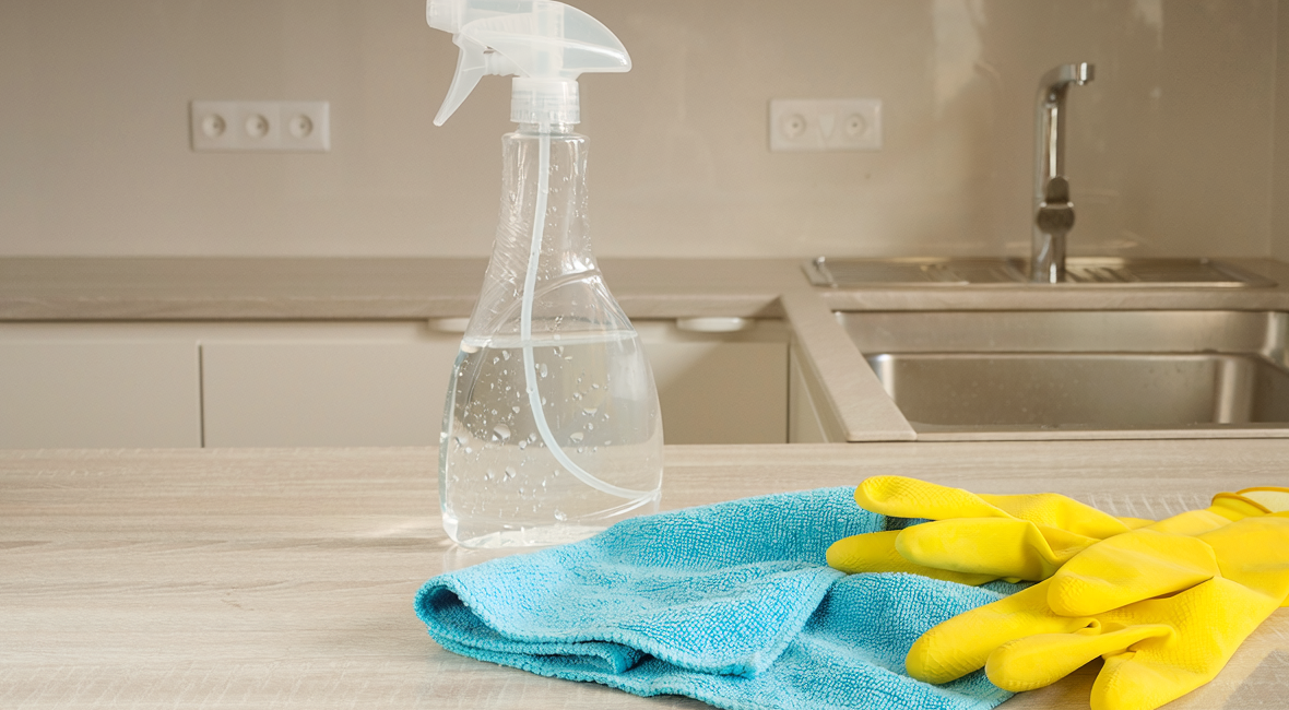 Domestic cleaning supplies on a kitchen bench