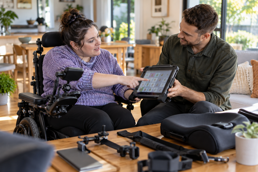 NDIS participant comparing assistive technology with an advisor