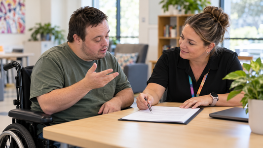 People with disability participating in a community art activity with support workers
