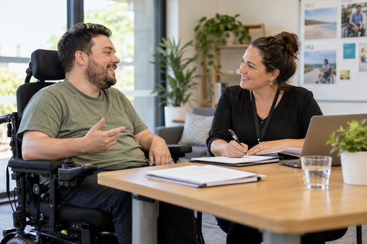 NDIS participant discussing support needs with a planner during plan development