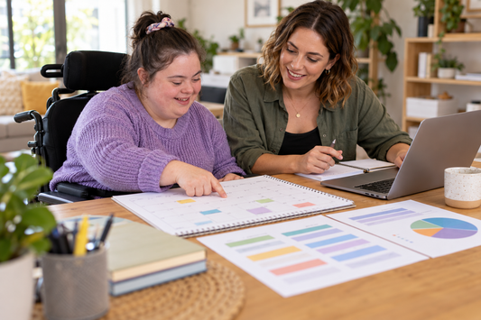 NDIS participant and support coordinator reviewing budget categories across a calendar