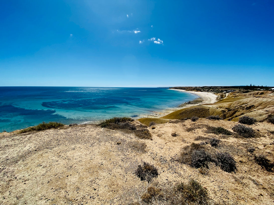 blue sea under blue sky during daytime