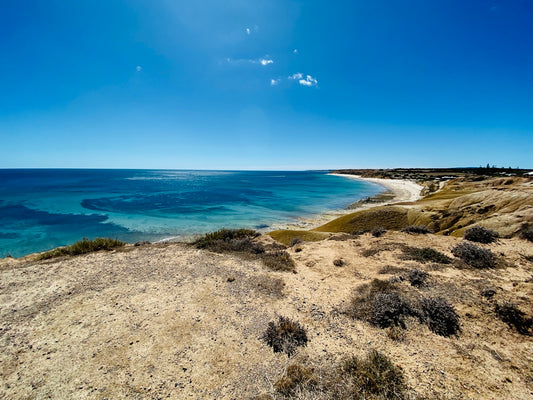 blue sea under blue sky during daytime