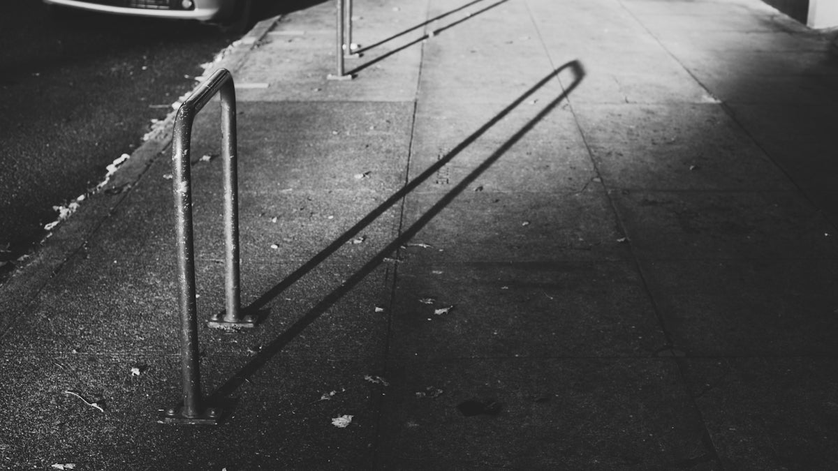 gray metal stand on gray concrete floor