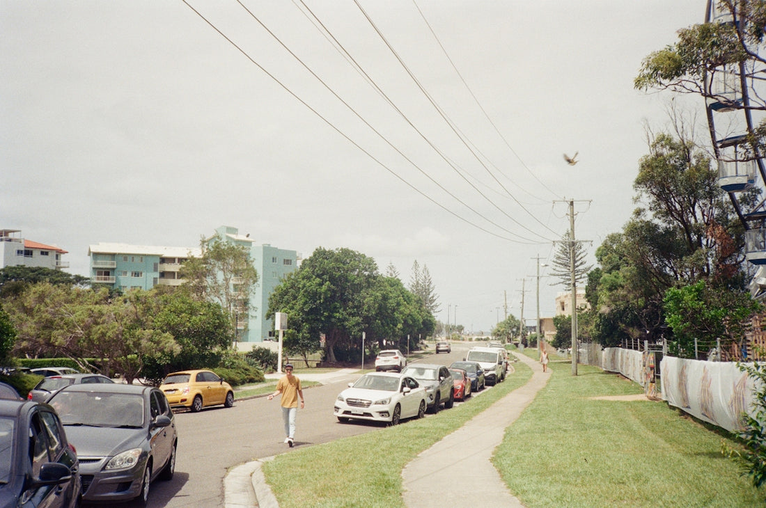 cars parked on side of the road during daytime