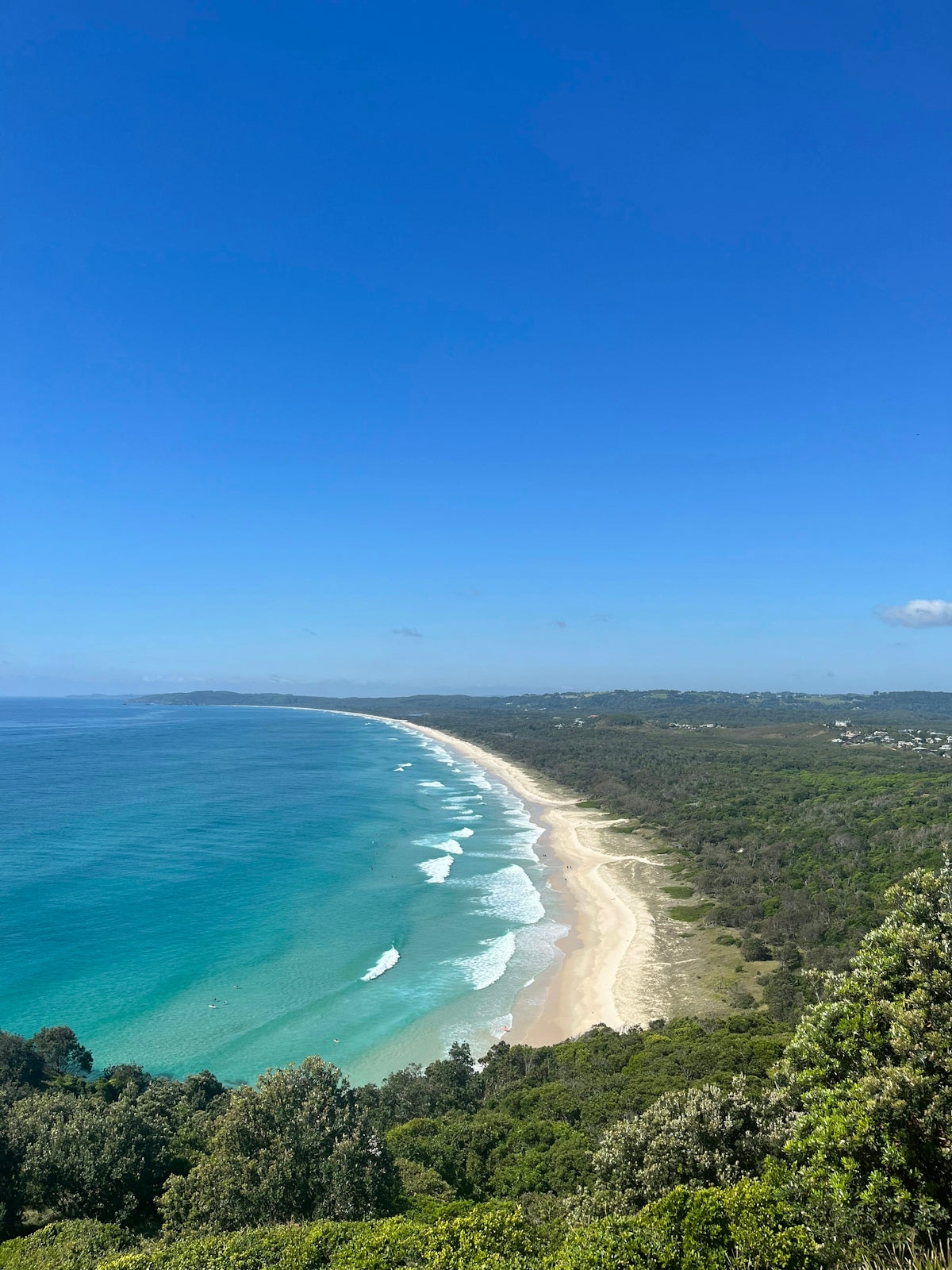 a view of a beach from a hill