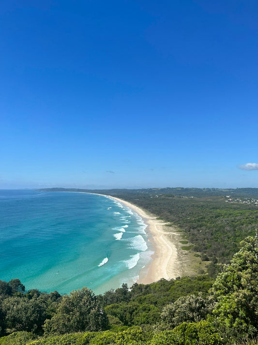 a view of a beach from a hill