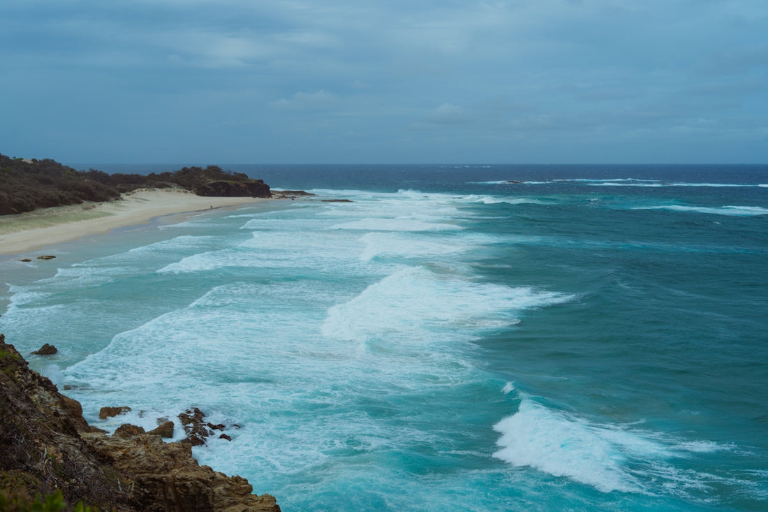 a view of the ocean from a cliff